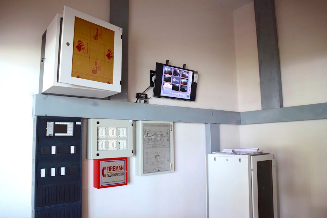 Broadcast control room with monitors and camera operator